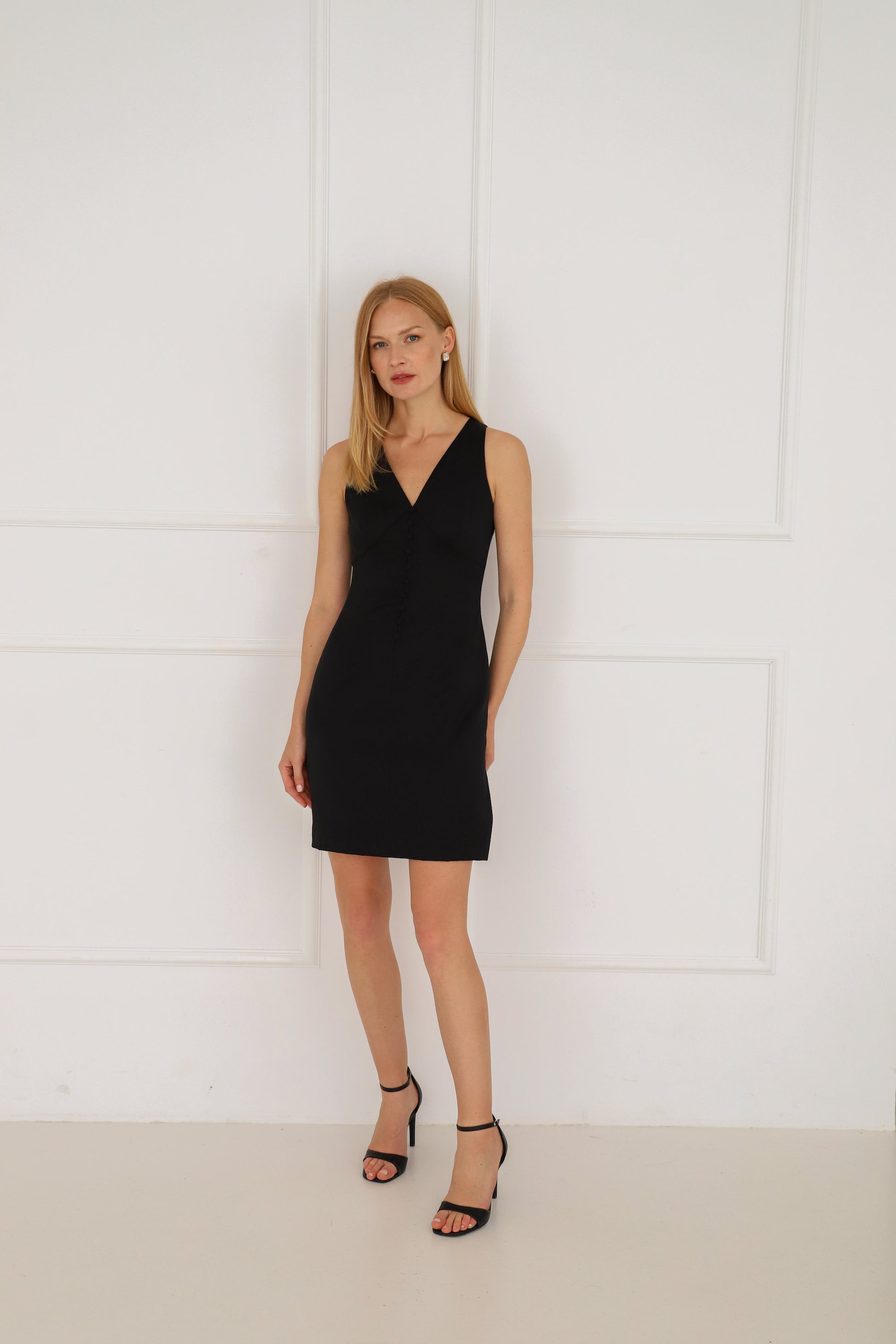Little fitted elegant black wool dress